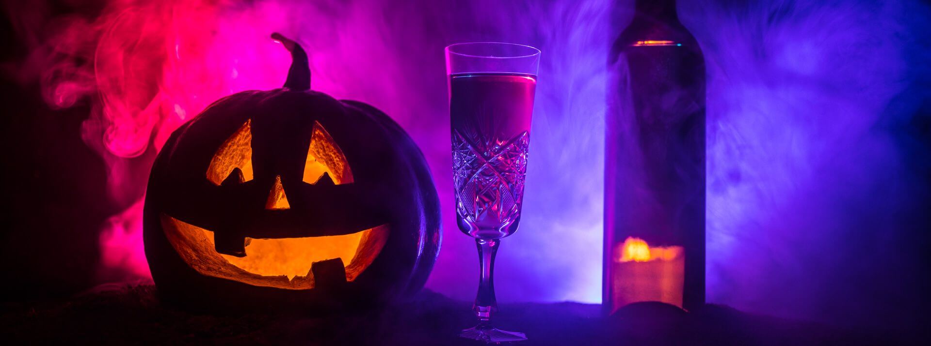 Jack-o-latern and wine bottle