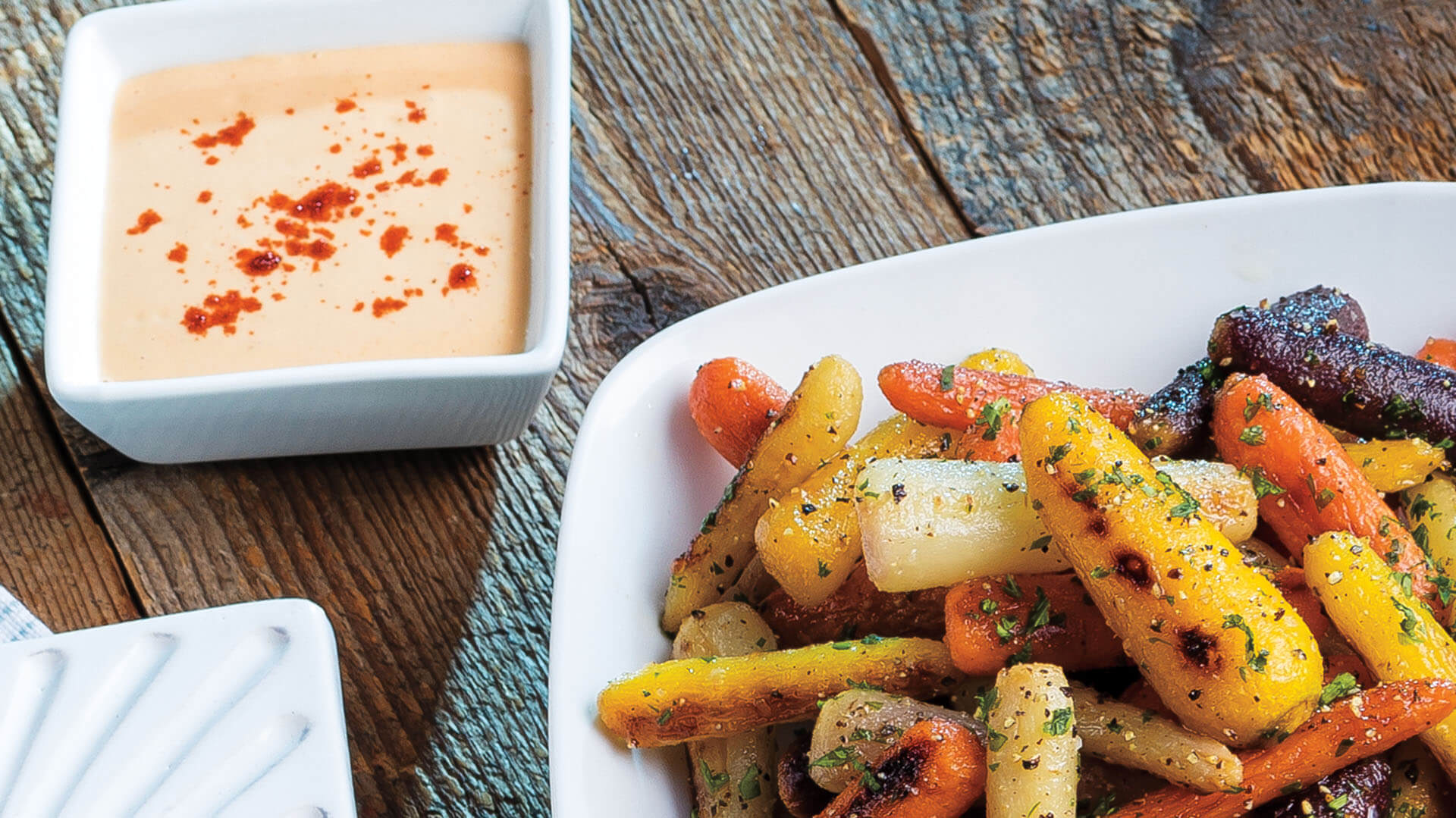 Roasted Rainbow Baby Carrots with Smoky Tahini & Parsley