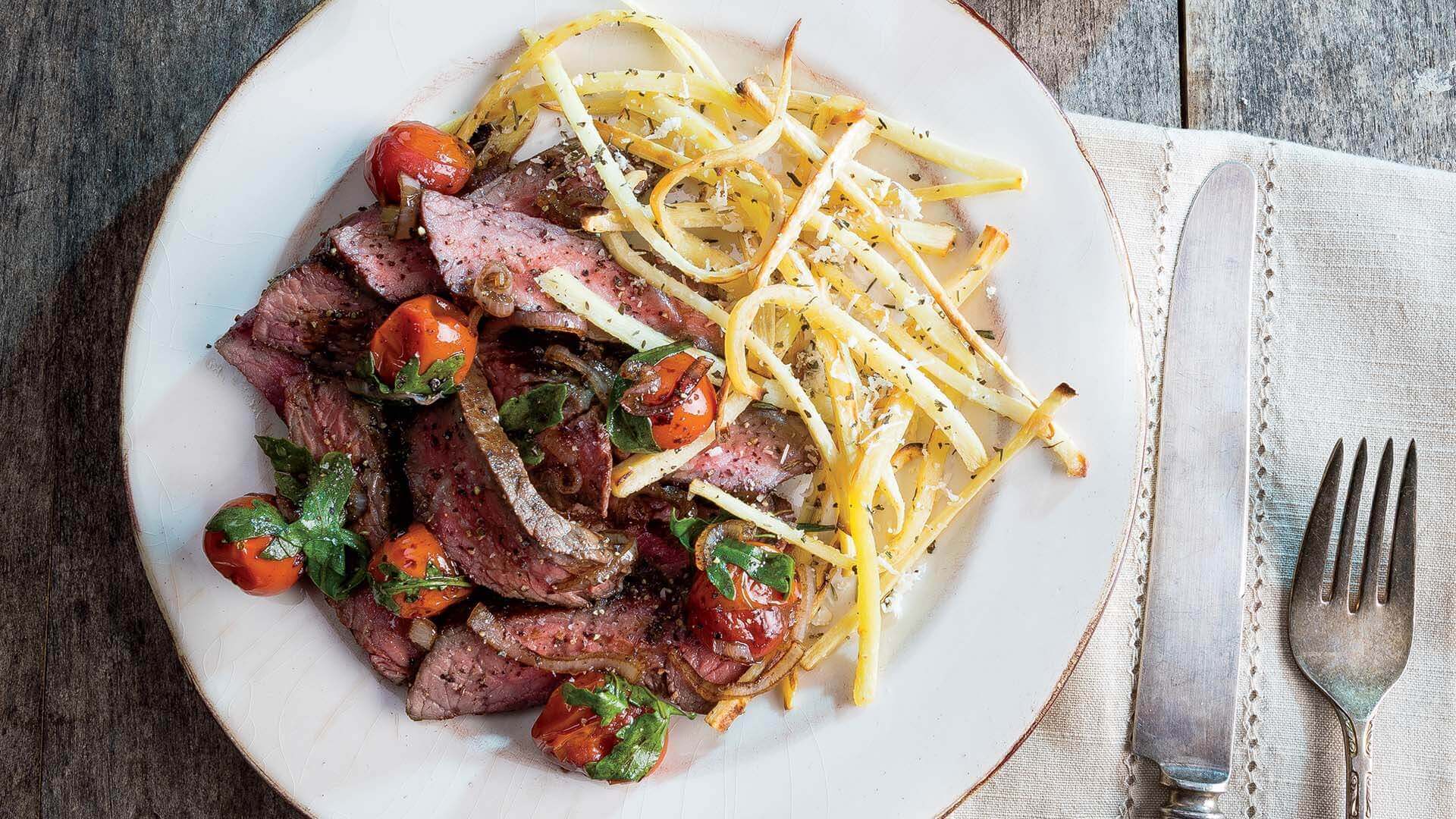 One-Pan Sirloin Steak with Zesty Parsnip Fries and Burst Tomato Topping